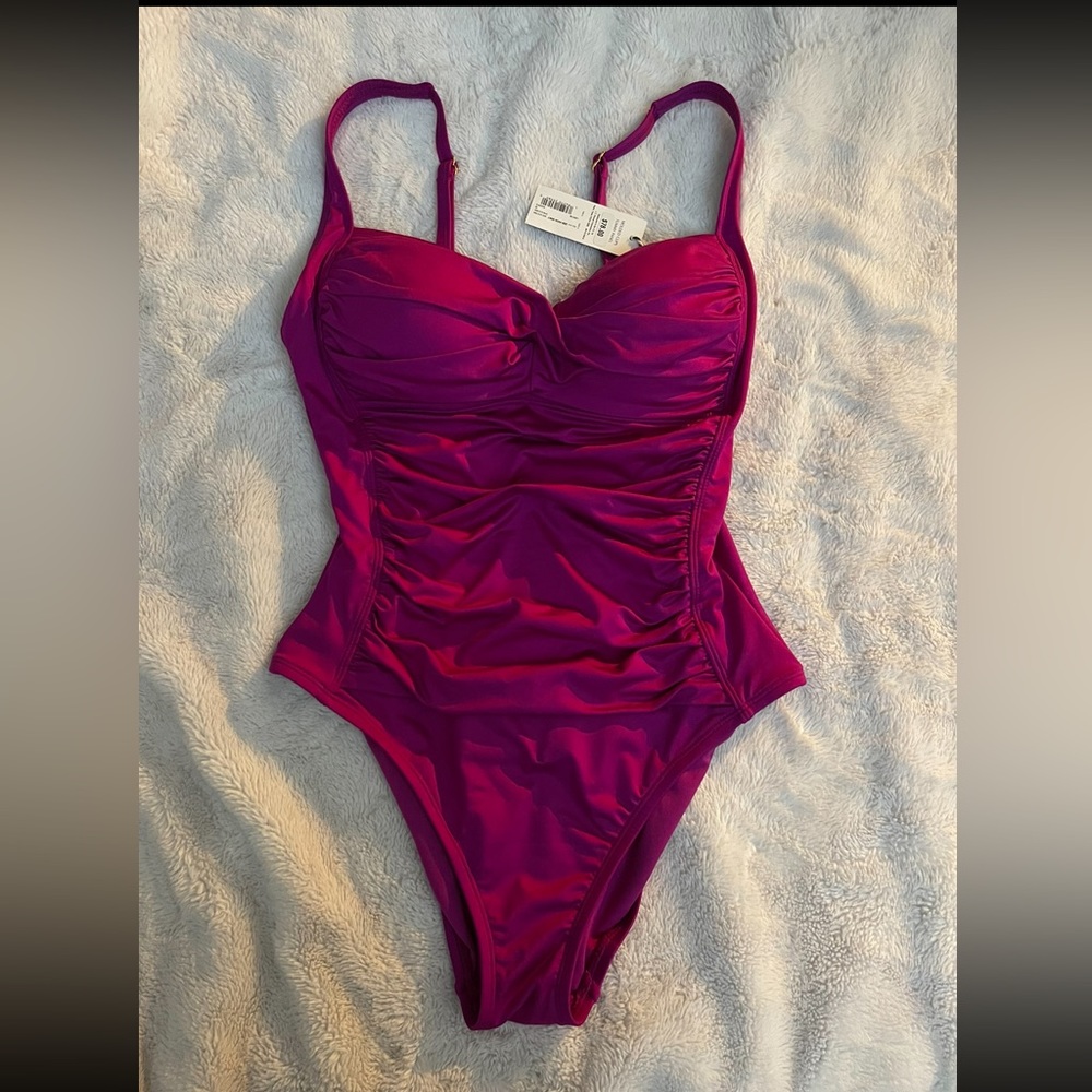 One piece magenta swim suit body shaping 😉 tag still on originally 78$